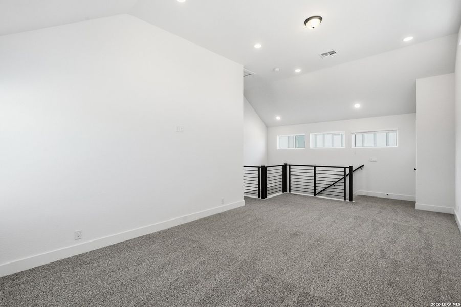 Spacious, unfurnished interior of a new home in Prominence, San Antonio (Image 28).