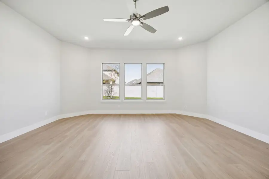 Representative unfurnished interior of a home built from the Kenai by Centre Living Homes in Painted Tree Lakeside, McKinney (Image 26).