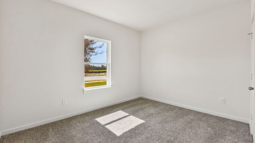 Spacious, unfurnished interior of a new home in Monarch Ranch, Manor (Image 44).