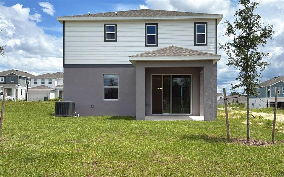 Front exterior of a new home in , Howey-in-the-Hills, FL, highlighting curb appeal (Image 2).