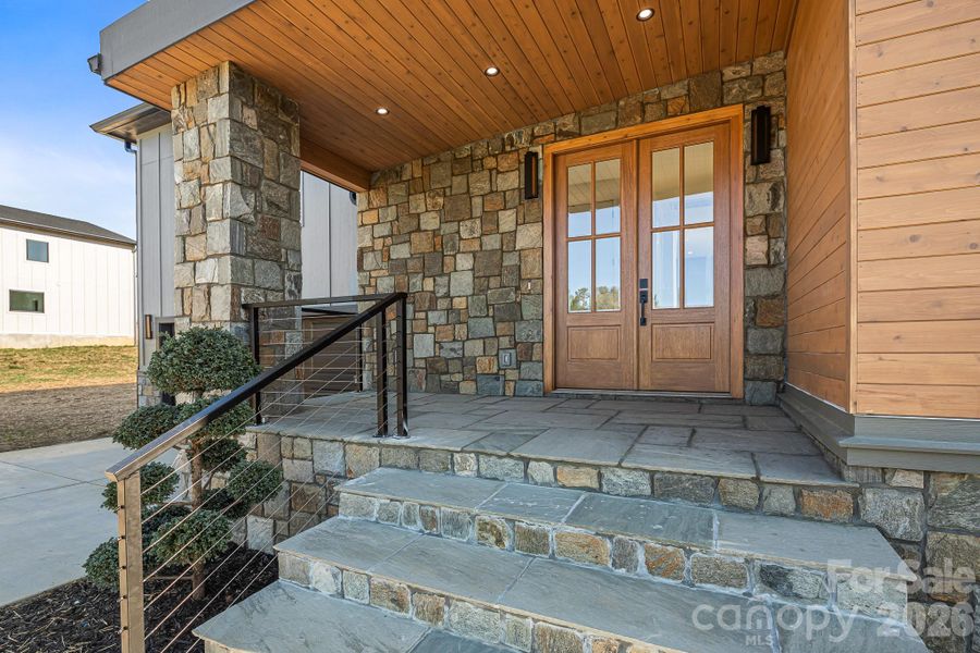 Exterior details and patio area of a home in , Flat Rock (Image 29).