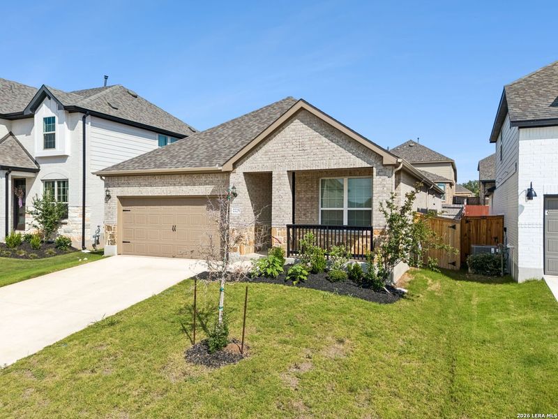 Front exterior of a new home in Sendero at Veramendi, New Braunfels, TX, highlighting curb appeal (Image 21).
