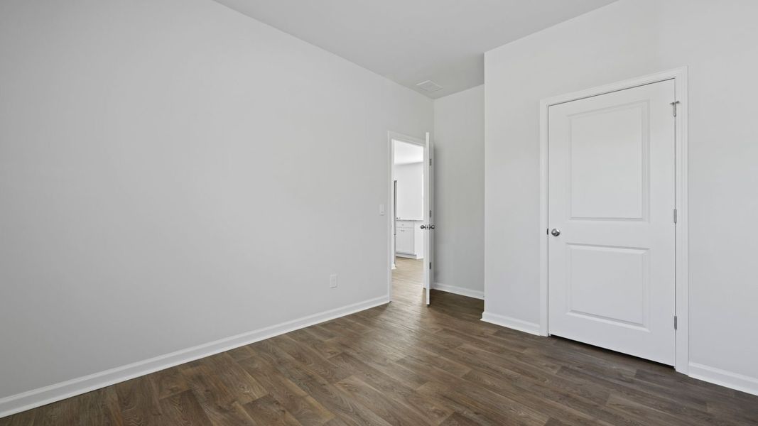 Representative unfurnished interior of a home built from the DOWNING by D.R. Horton in The Oaks at Center Station, Hollywood (Image 16).