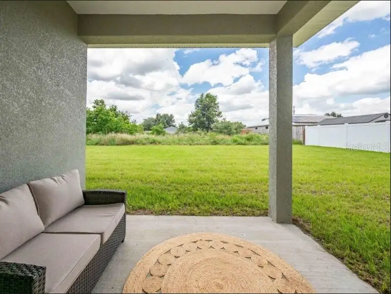 Exterior details and patio area of a home in , Ocala (Image 4).