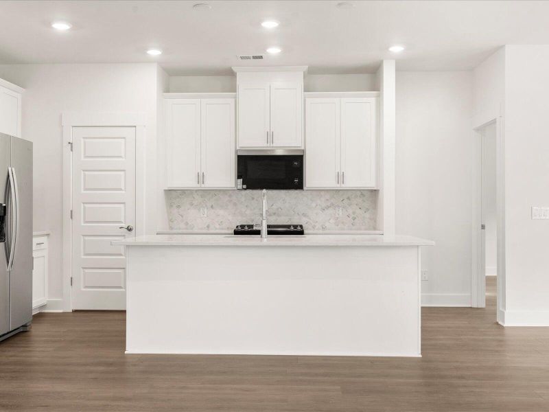 Furnished interior view inside a new home in The Coves at Lakes of Cane Bay, Summerville (Image 13). Furnished interior view inside a new home in The Coves at Lakes of Cane Bay, Summerville (Image 13).