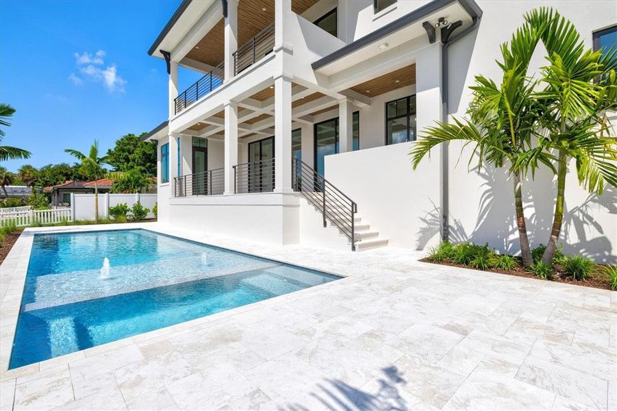 Front exterior of a new home in , Longboat Key, FL, highlighting curb appeal (Image 23). Front exterior of a new home in , Longboat Key, FL, highlighting curb appeal (Image 23).
