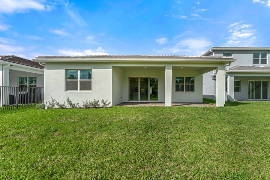 Exterior details and patio area of a home in Tradition, Port St. Lucie (Image 2).