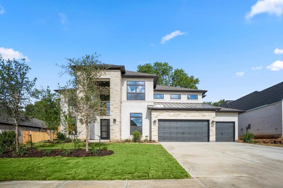 Front exterior of a new home in Briarley, Montgomery, TX, highlighting curb appeal (Image 2).