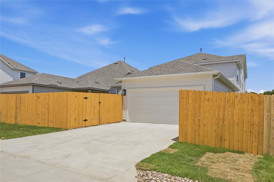 Exterior details and patio area of a home in Creeks Crossing, Elgin (Image 2). Exterior details and patio area of a home in Creeks Crossing, Elgin (Image 2).