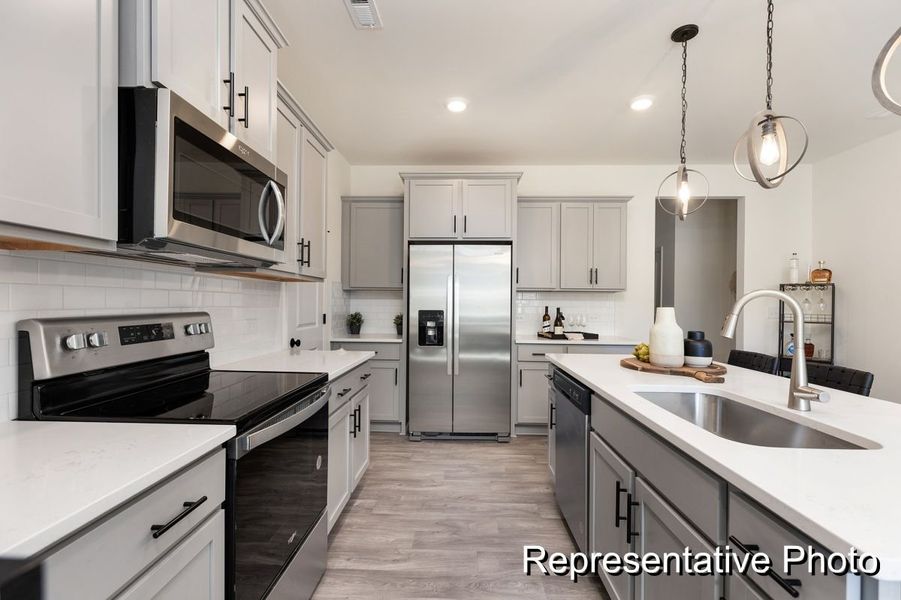 Furnished interior view inside a new home in Village Heights TH, Greensboro (Image 2).