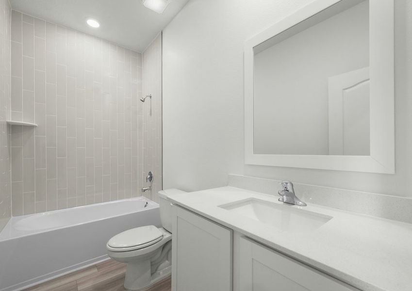 Secondary bathroom with tile detail