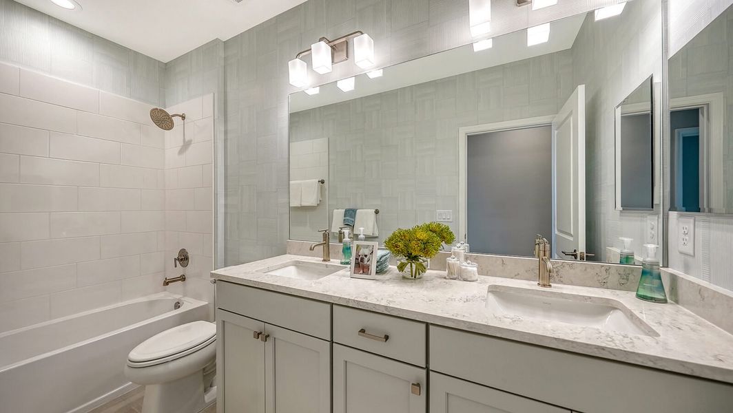 Representative furnished interior of a home built from the Parker by Neal Communities in SkySail, Naples (Image 34).