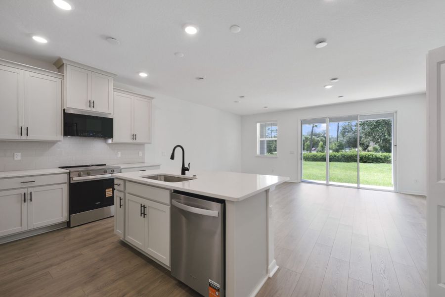 Furnished interior view inside a new home in Towns at Riverwalk, Sanford (Image 8). Furnished interior view inside a new home in Towns at Riverwalk, Sanford (Image 8).