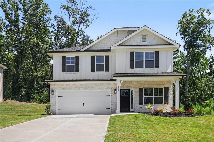 Front exterior of a new home in Thunder Ridge, Dawsonville, GA, highlighting curb appeal (Image 2). Front exterior of a new home in Thunder Ridge, Dawsonville, GA, highlighting curb appeal (Image 2).