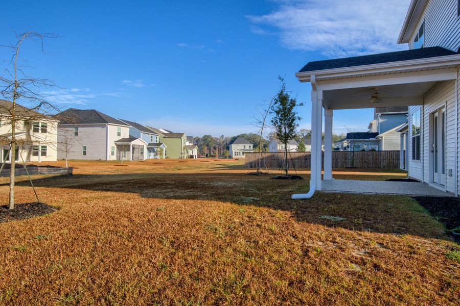 Exterior details and patio area of a home in Six Oaks, Summerville (Image 4). Exterior details and patio area of a home in Six Oaks, Summerville (Image 4).
