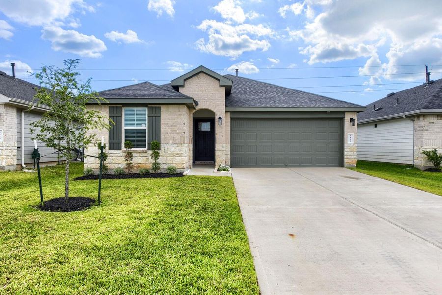 Front exterior of a new home in , Fulshear, TX, highlighting curb appeal (Image 2). Front exterior of a new home in , Fulshear, TX, highlighting curb appeal (Image 2).