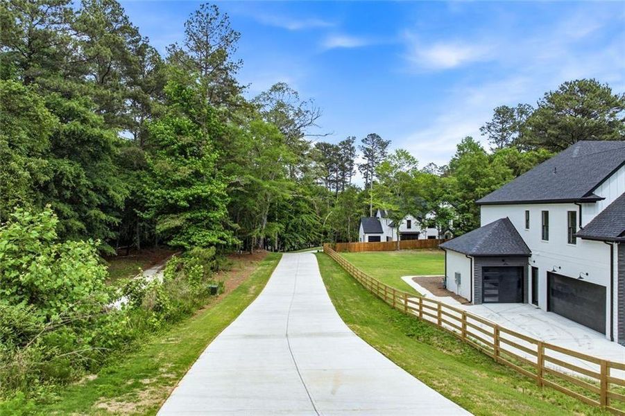 Front exterior of a new home in , Lawrenceville, GA, highlighting curb appeal (Image 26).