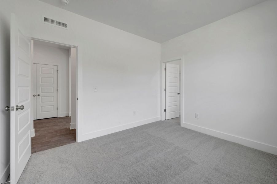 Spacious, unfurnished interior of a new home in McAlister Creek, Clayton (Image 26).