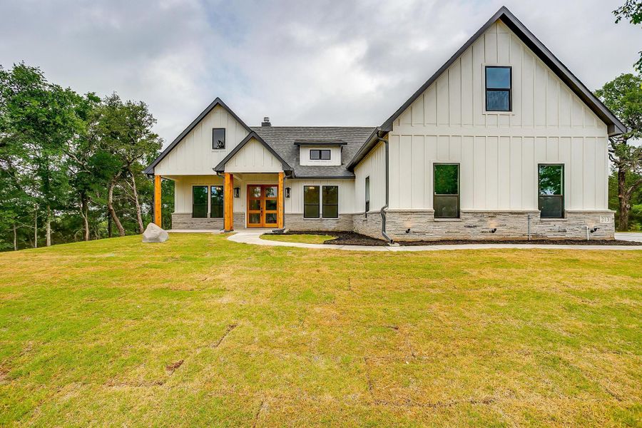 Representative exterior photo of a completed home built from the Cherry Laurel by Trinity Classic Homes in Zion Trails, Poolville, TX (Image 2). Representative exterior photo of a completed home built from the Cherry Laurel by Trinity Classic Homes in Zion Trails, Poolville, TX (Image 2).