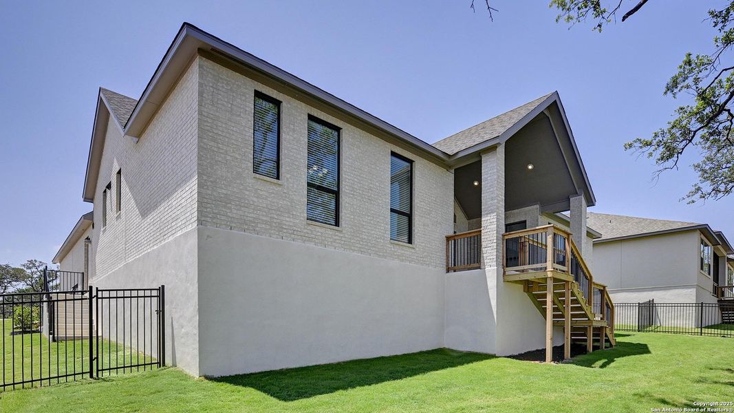 Front exterior of a new home in , Boerne, TX, highlighting curb appeal (Image 24). Front exterior of a new home in , Boerne, TX, highlighting curb appeal (Image 24).