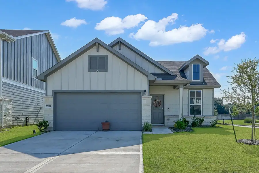 Front exterior of a new home in , Hockley, TX, highlighting curb appeal (Image 1).