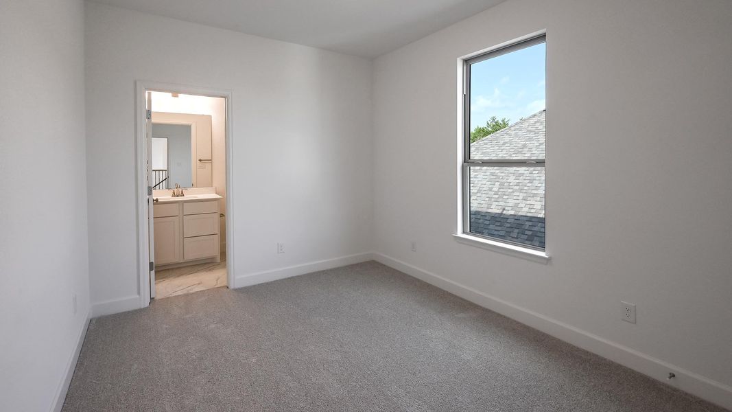 Spacious, unfurnished interior of a new home in 6 Creeks, Kyle (Image 14).