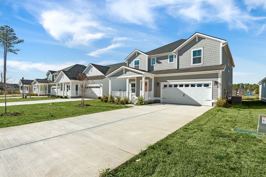 Front exterior of a new home in , Summerville, SC, highlighting curb appeal (Image 2). Front exterior of a new home in , Summerville, SC, highlighting curb appeal (Image 2).