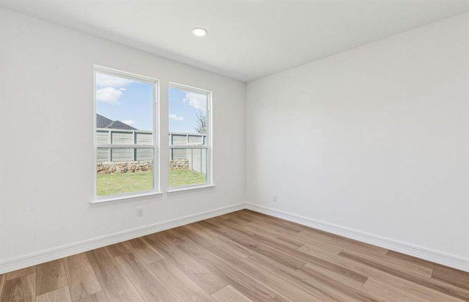 Formal dining room with large windows Formal dining room with large windows