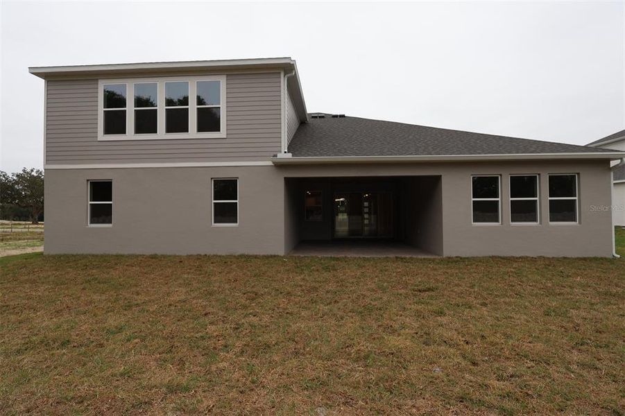 Exterior details and patio area of a home in Willow Run, Apopka (Image 19). Exterior details and patio area of a home in Willow Run, Apopka (Image 19).