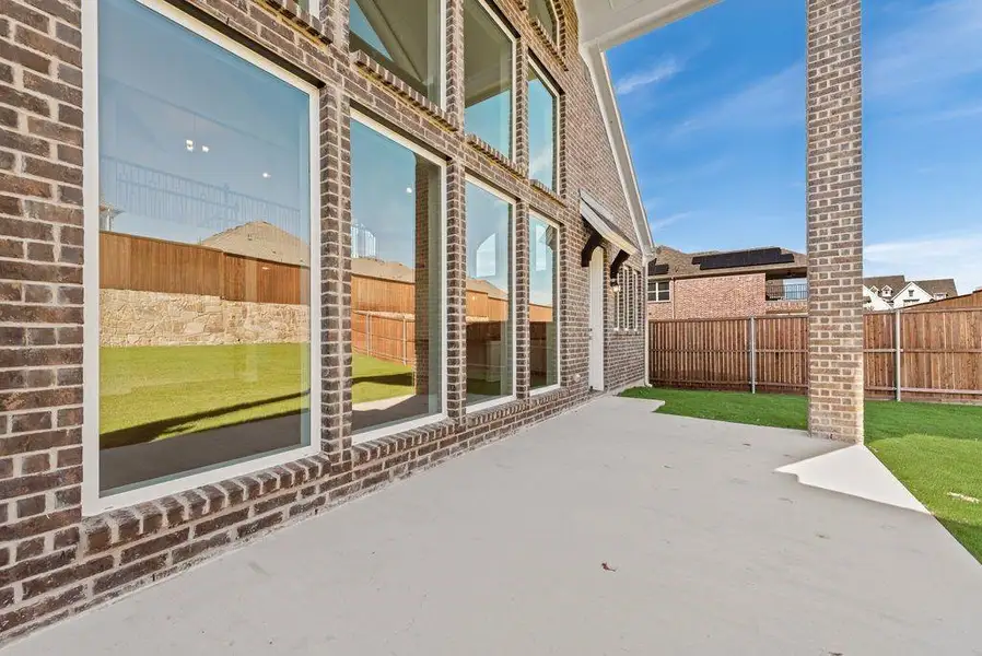 Exterior details and patio area of a home in Monterra, Rockwall (Image 2). Exterior details and patio area of a home in Monterra, Rockwall (Image 2).