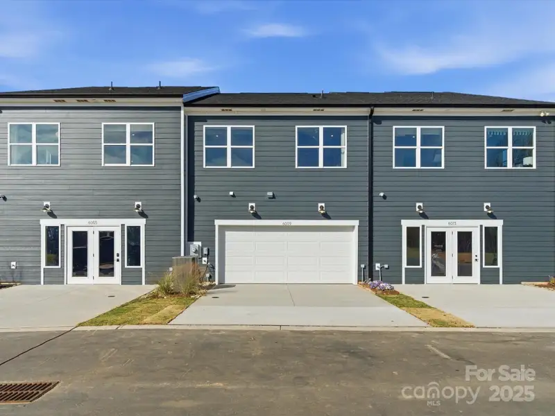 Rear Load 2-Bay Garage with Full Length Driveway. *Model Photos | Actual Finishes, Structural Selections, and Orientation May Vary.