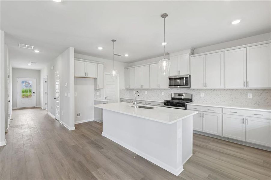 Furnished interior view inside a new home in Martin Springs - Estate Series, Lawrenceville (Image 11).