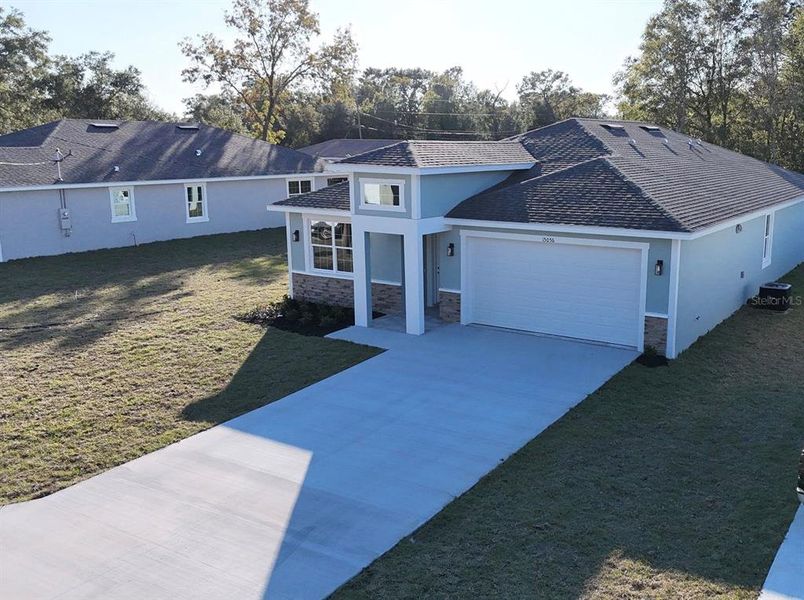 Exterior details and patio area of a home in , Summerfield (Image 32).