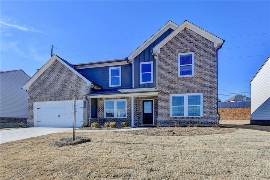 Front exterior of a new home in , Auburn, GA, highlighting curb appeal (Image 1). Front exterior of a new home in , Auburn, GA, highlighting curb appeal (Image 1).