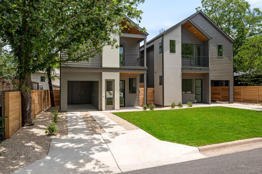 Modern architecture defines these residences, each boasting private balconies and vibrant green lawns.