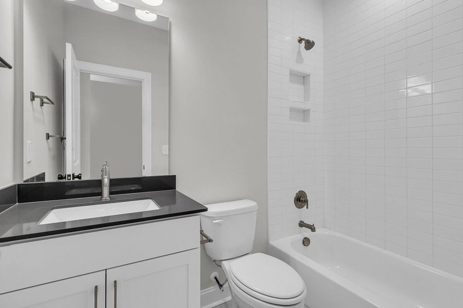 Furnished interior view inside a new home in Tidewater at Lakes of Cane Bay, Summerville (Image 11).