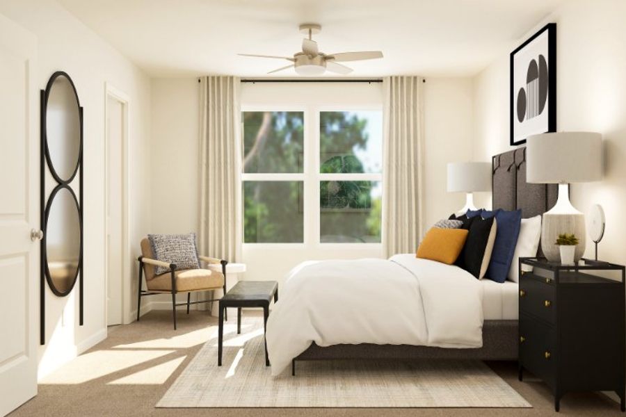 A bedroom with a bed and a fan. A bedroom with a bed and a fan.