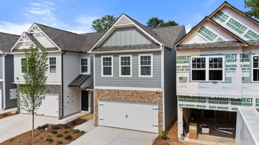 Front exterior of a new home in Owen Preserve, Canton, GA, highlighting curb appeal (Image 3). Front exterior of a new home in Owen Preserve, Canton, GA, highlighting curb appeal (Image 3).