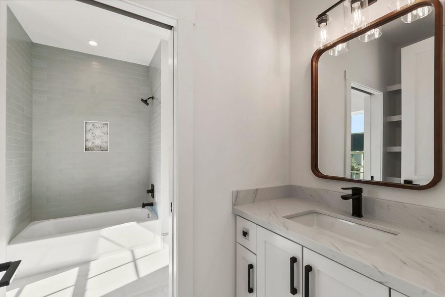 Jack & Jill Bathroom connecting bedrooms 2 & 3.