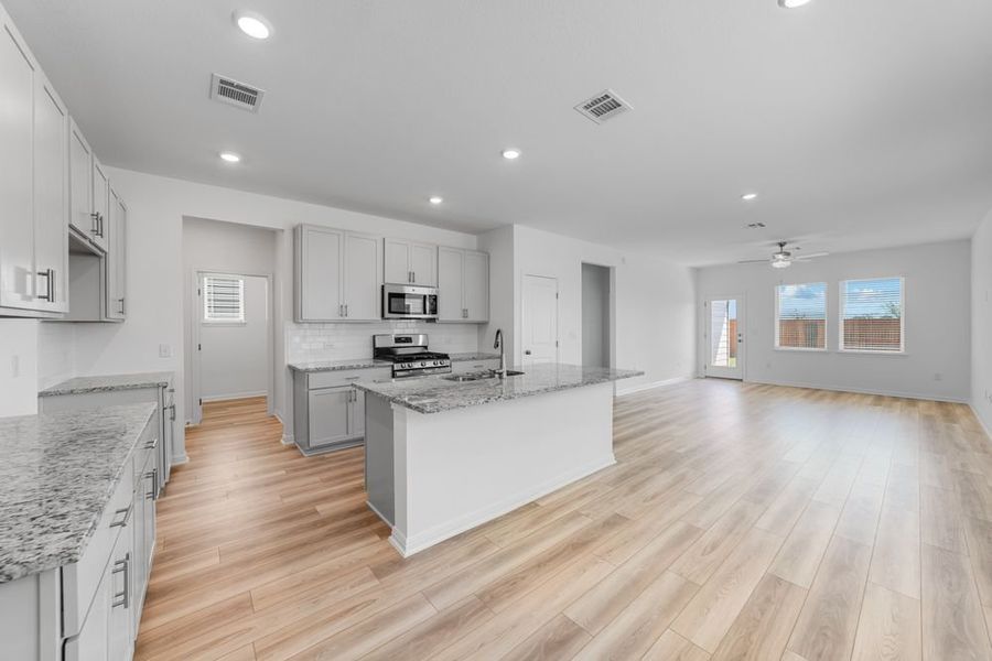 Furnished interior view inside a new home in Longview 40s, Del Valle (Image 10).