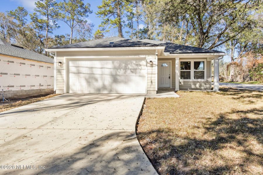 Front exterior of a new home in , Jacksonville, FL, highlighting curb appeal (Image 14). Front exterior of a new home in , Jacksonville, FL, highlighting curb appeal (Image 14).