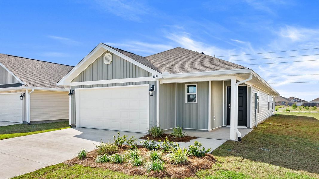 Front exterior of a new home in Titus Park, Panama City, FL, highlighting curb appeal (Image 20). Front exterior of a new home in Titus Park, Panama City, FL, highlighting curb appeal (Image 20).