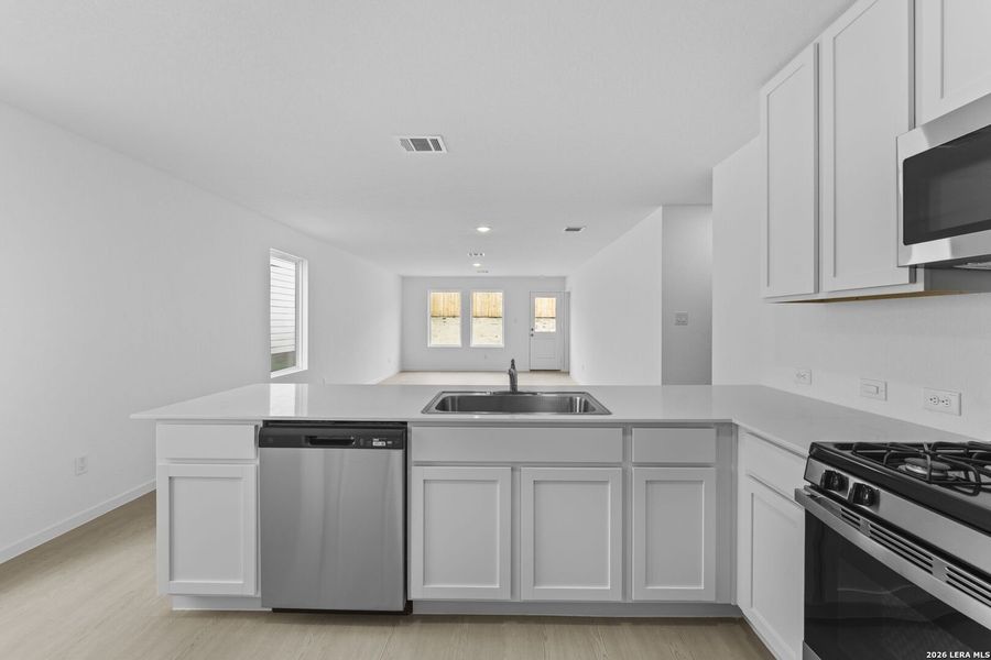 Furnished interior view inside a new home in Waterwheel, San Antonio (Image 6).