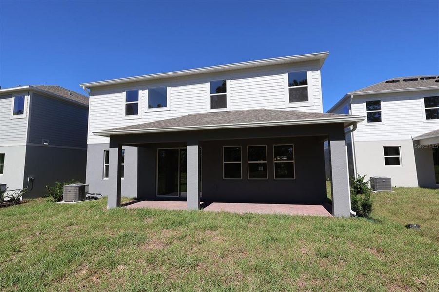 Exterior details and patio area of a home in Eden at Crossprairie, St. Cloud (Image 24).