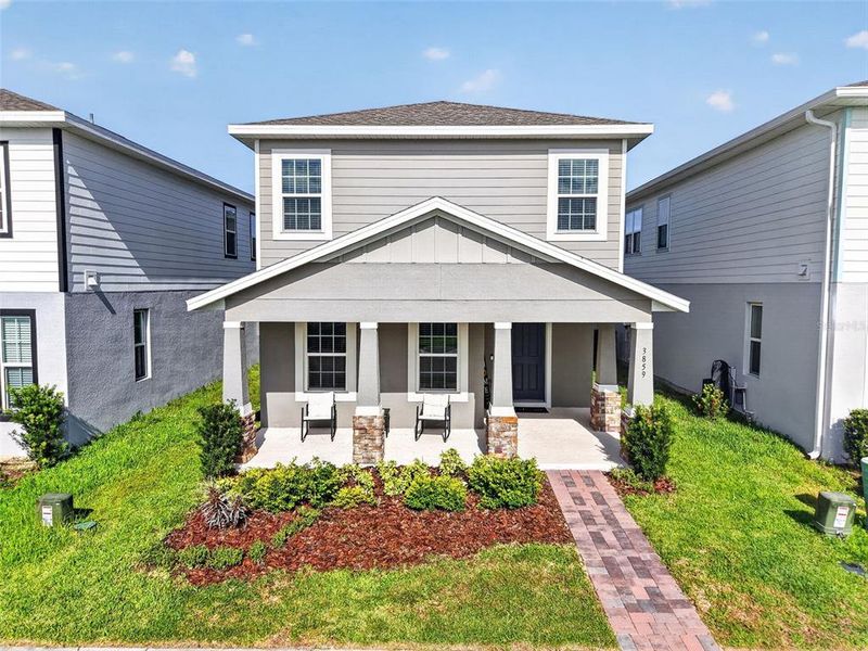 Front exterior of a new home in , Apopka, FL, highlighting curb appeal (Image 25).