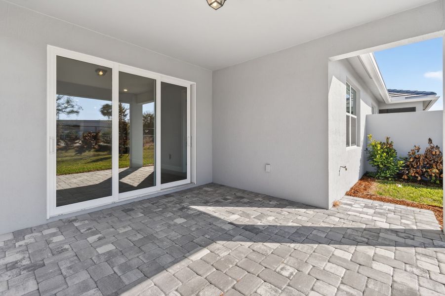 Exterior details and patio area of a home in Costa Pointe, Vero Beach (Image 37).