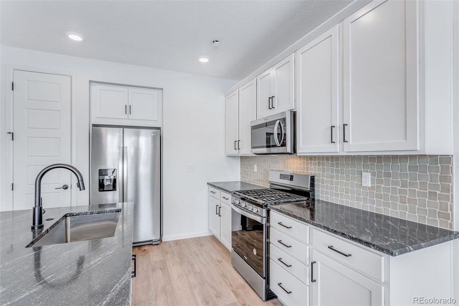Furnished interior view inside a new home in Westside Crossing, Berthoud (Image 11).