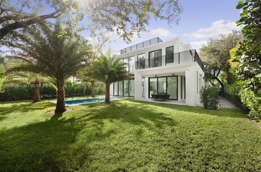 Exterior details and patio area of a home in , South Miami (Image 4).