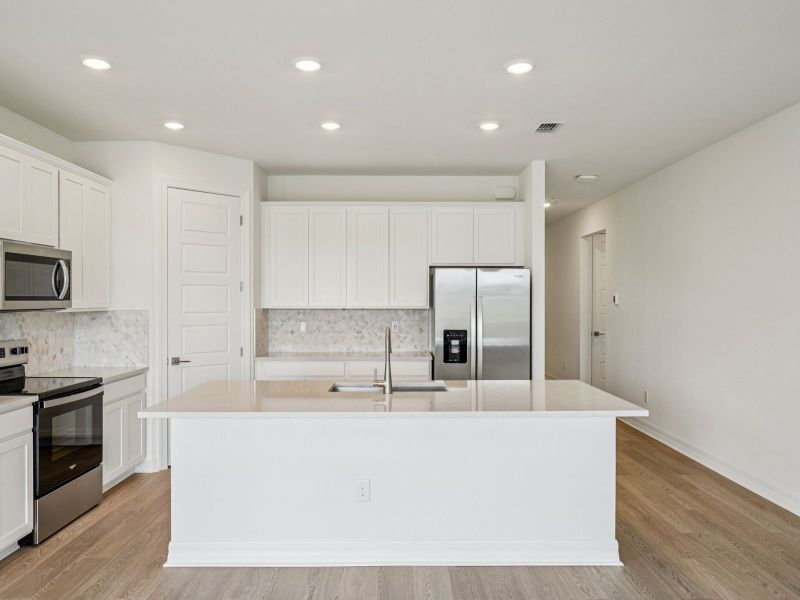 Furnished interior view inside a new home in Crescent Lakes - Reserve Series, Punta Gorda (Image 5).