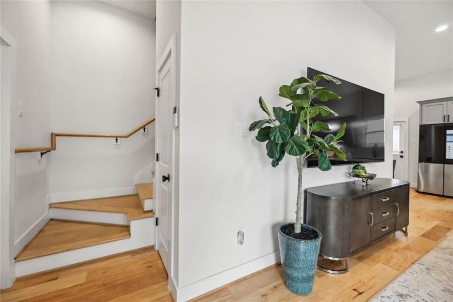 Staircase leading to second level from foyer.